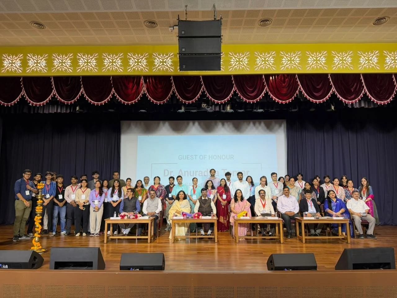 Organizing committee, student committee, guests, and dignitaries together on stage