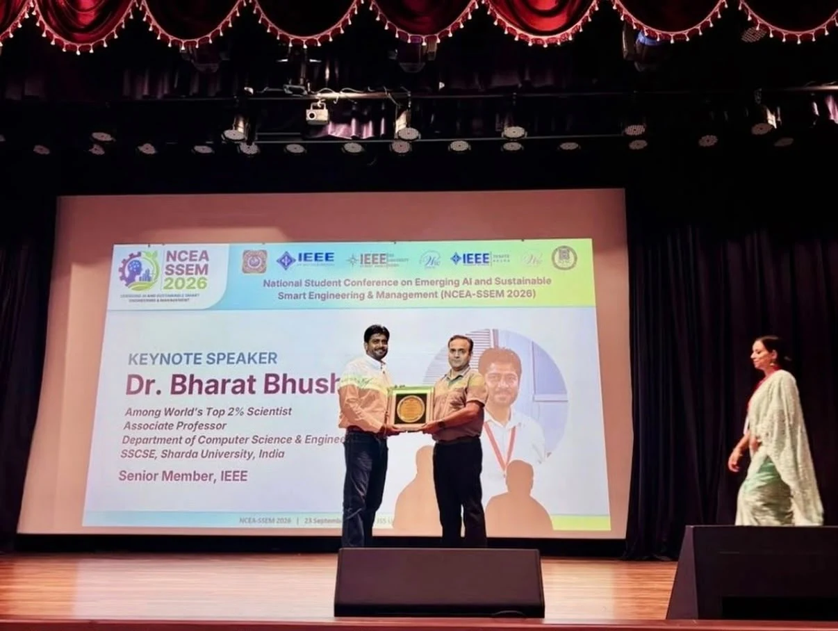 Keynote Speaker Dr. Bharat Bhushan receiving a commemorative plaque