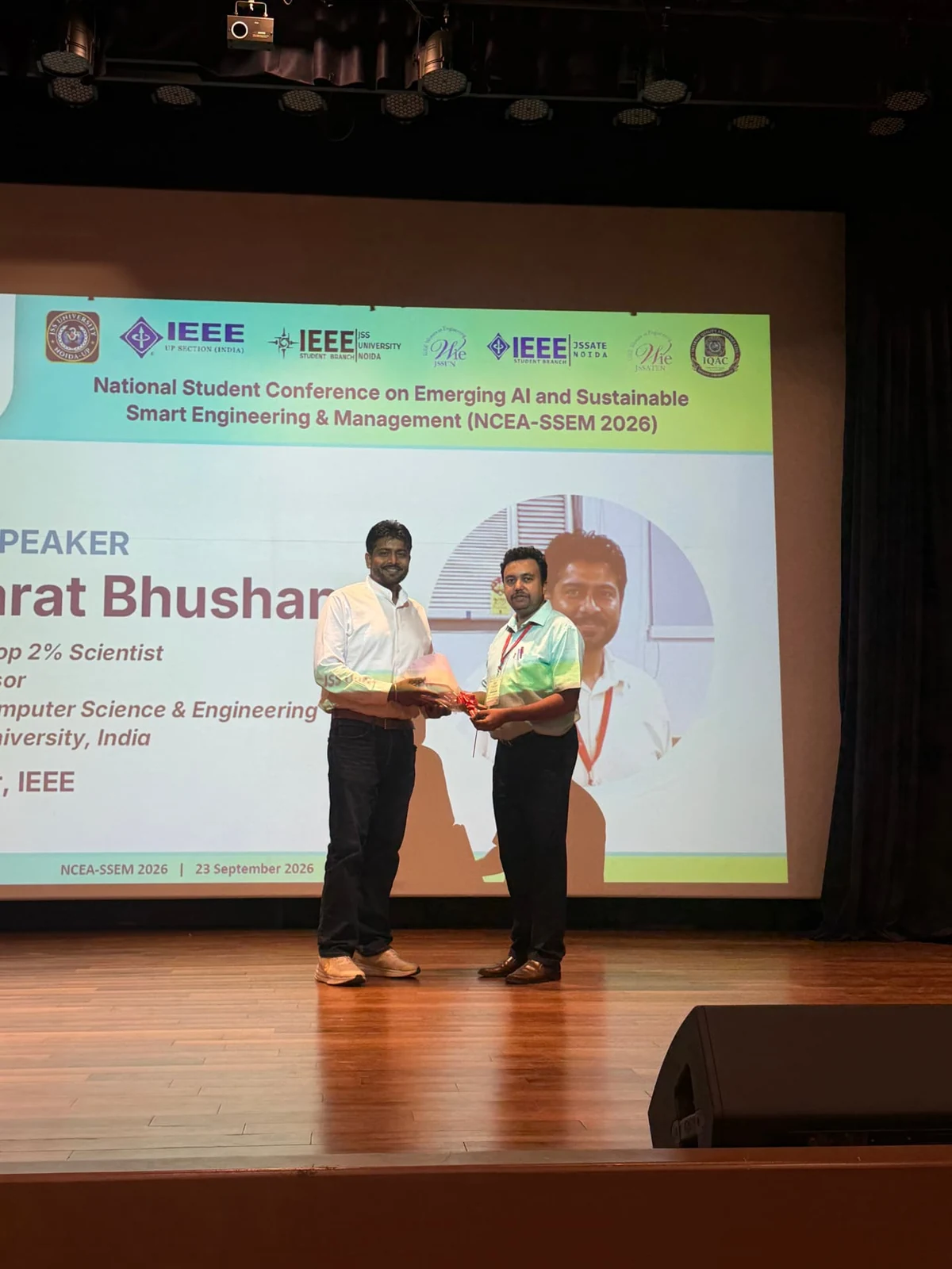 The keynote speaker being welcomed before the session